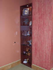 Built-In Display with Glass Shelves and Light